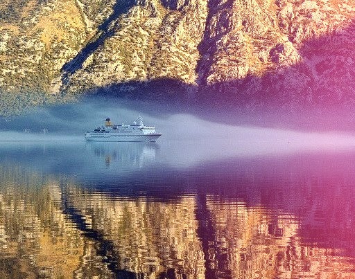 by Atilla2008 on Flickr.Ghostly Cruise Ship slowly gliding up the Bay of Kotor in Montenegro.