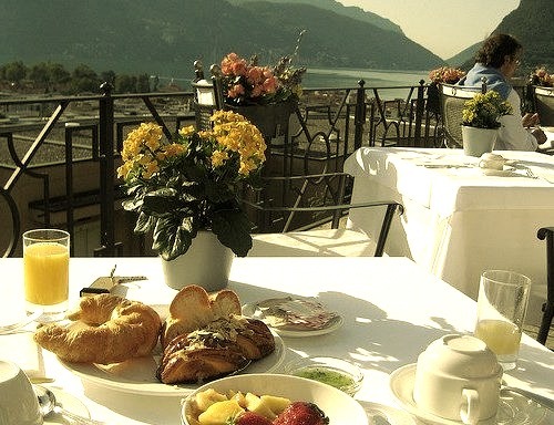 Having breakfast on the shores of Lago Maggiore, Ticino, Switzerland